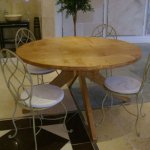 Round Table - With hand-carved Lily on each piece.